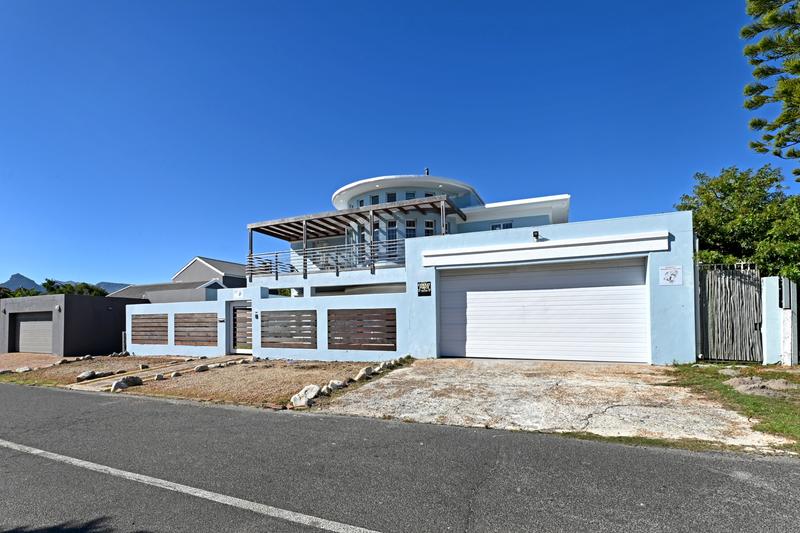 Character-Filled Coastal Home with Space, Views & Serious Garage Power
